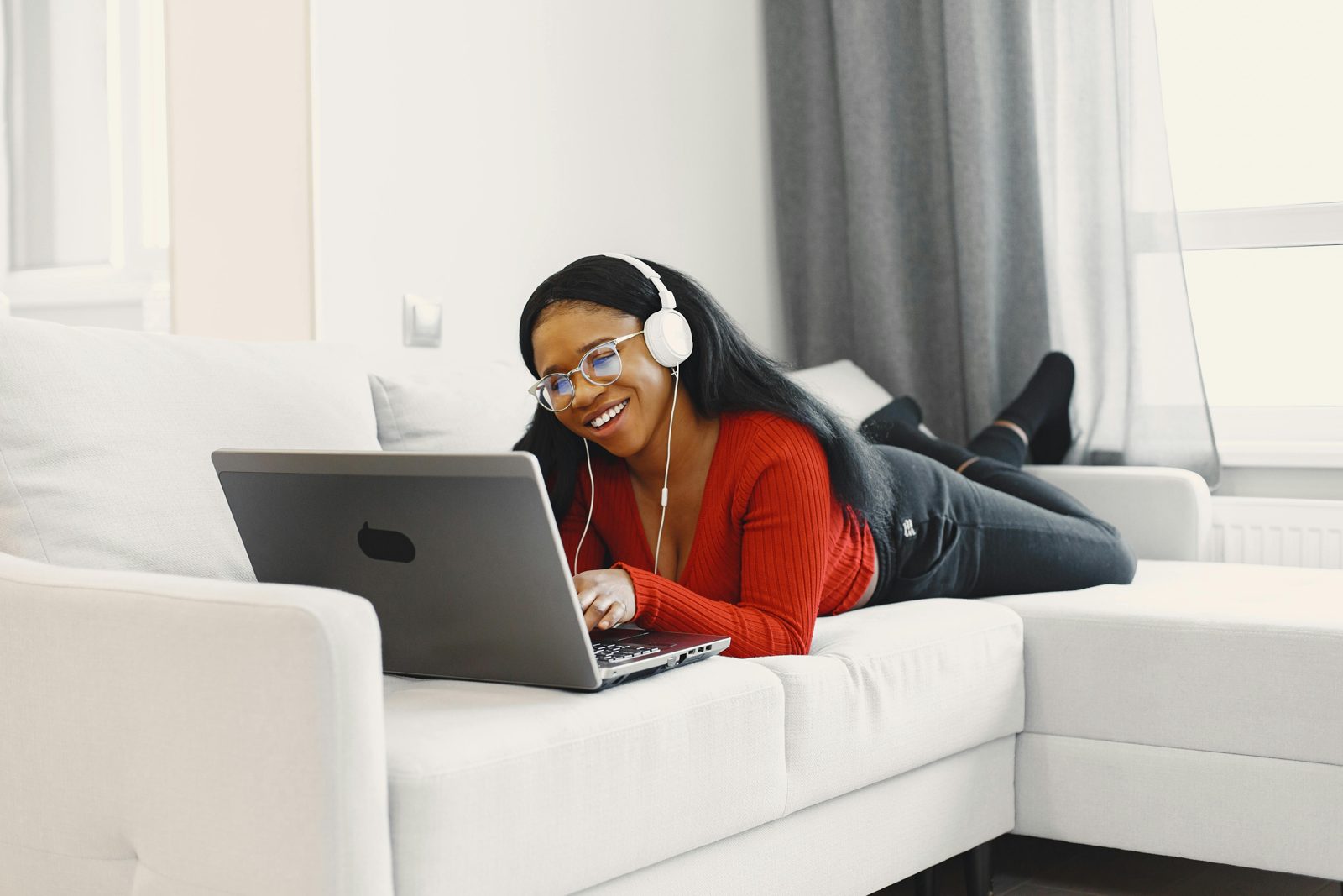 A woman using a laptop at home